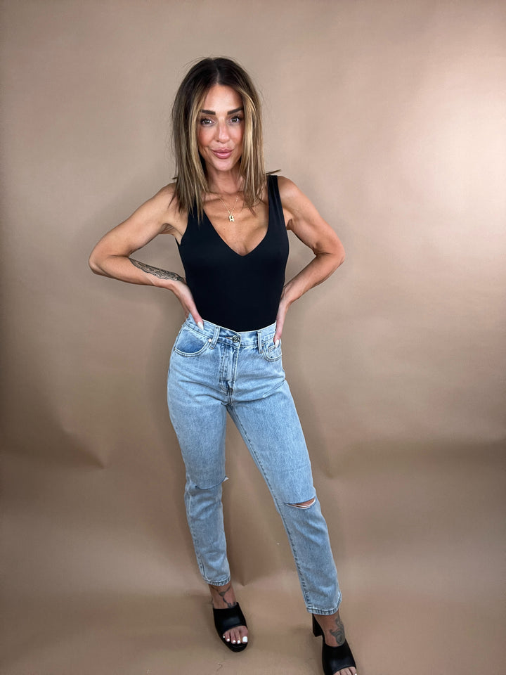 Rachel High Rise Distressed Tapered Leg Denim