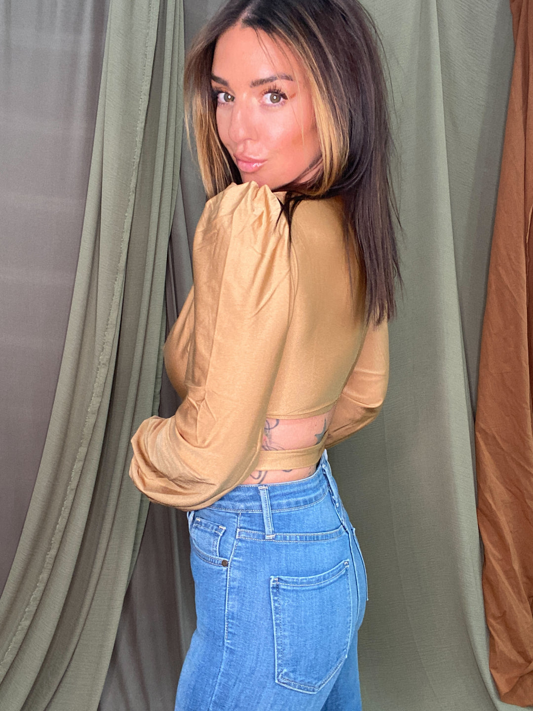 Attraction Long Sleeve Cut Out Bodysuit in Bronze