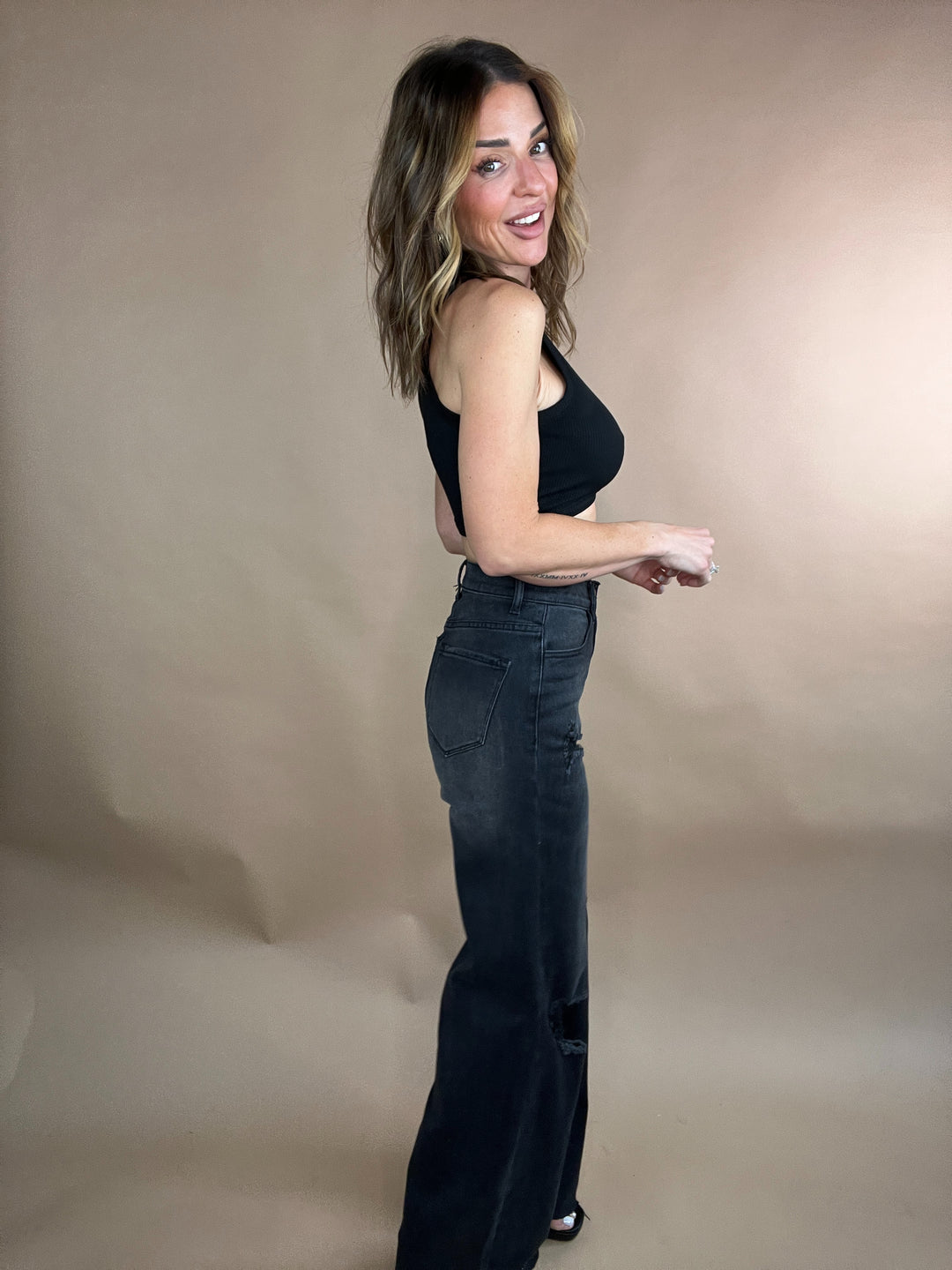 washed black high rise denim 